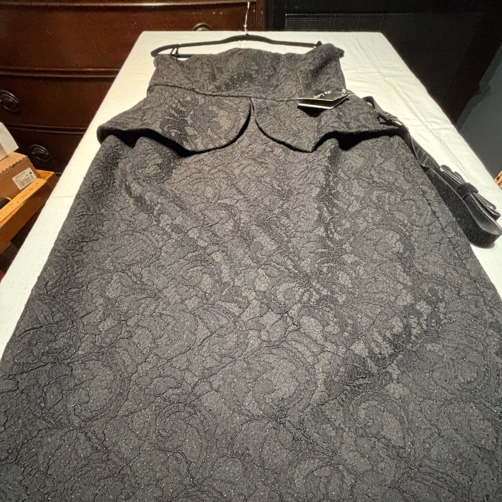 Black belted jacquard dress can be worn strapless or with straps